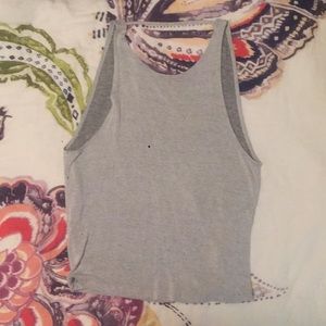 Gray, low cut out back tank. Sz M